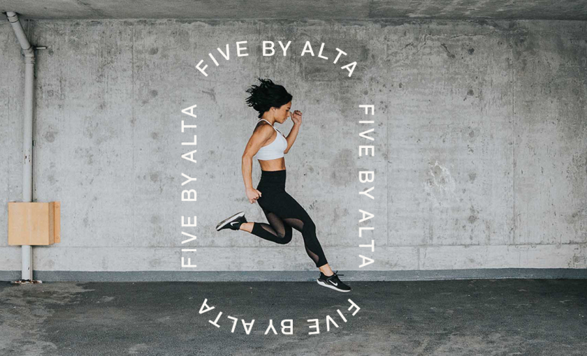 The essence of exceptional living exercising woman caught jumping in mid-air