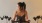 a woman riding a stationary bike